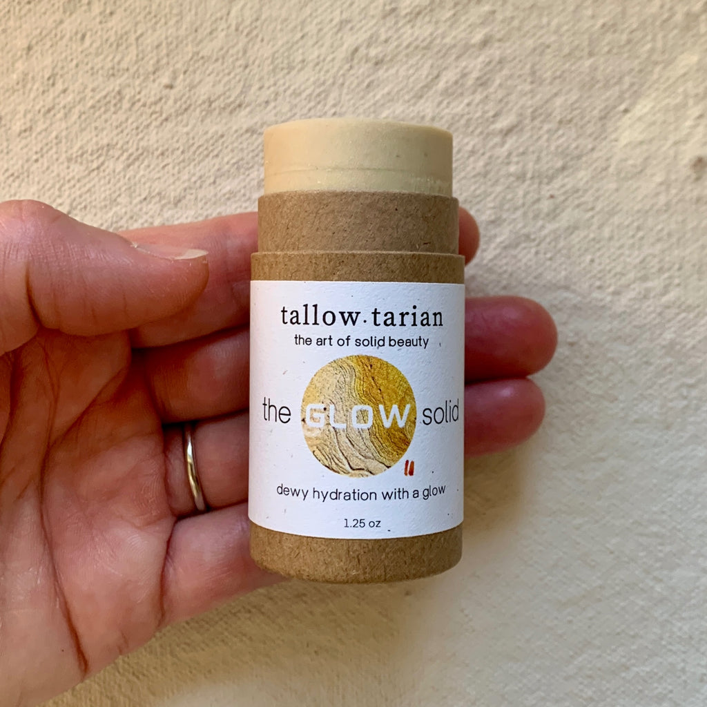 The Over All Glow Solid held in hand