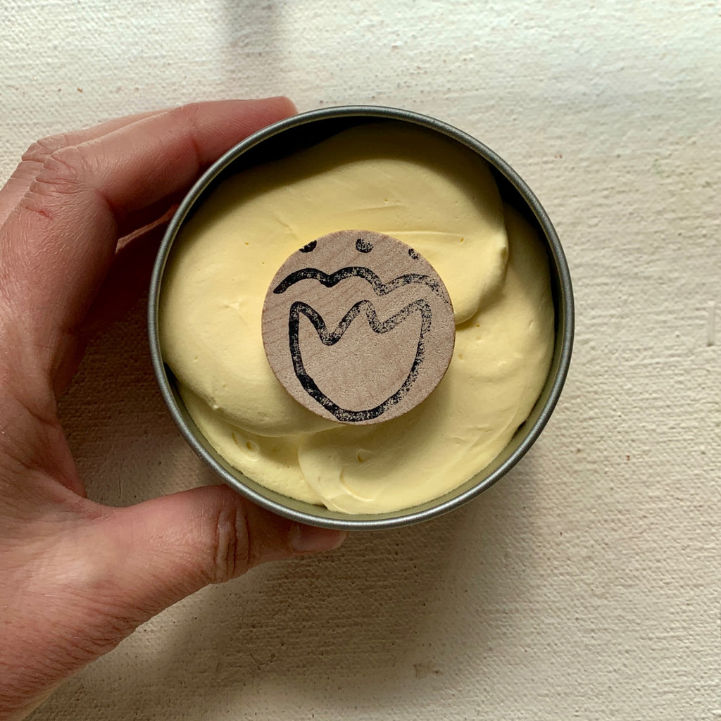 The Over All Paste 8oz open with wooden disc