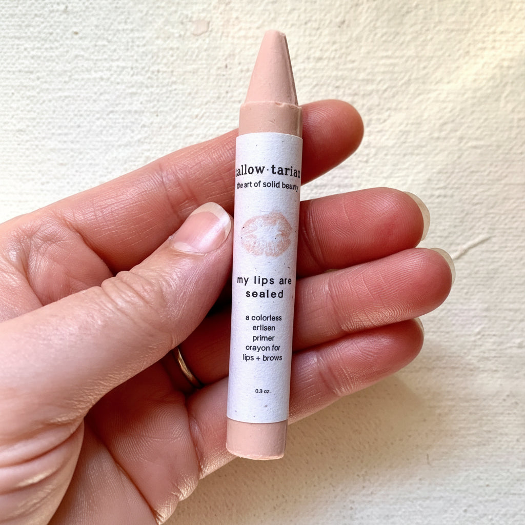 My Lips Are Sealed primer crayon held in hand