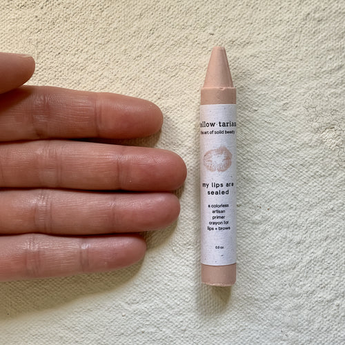 My Lips Are Sealed primer crayon with hand
