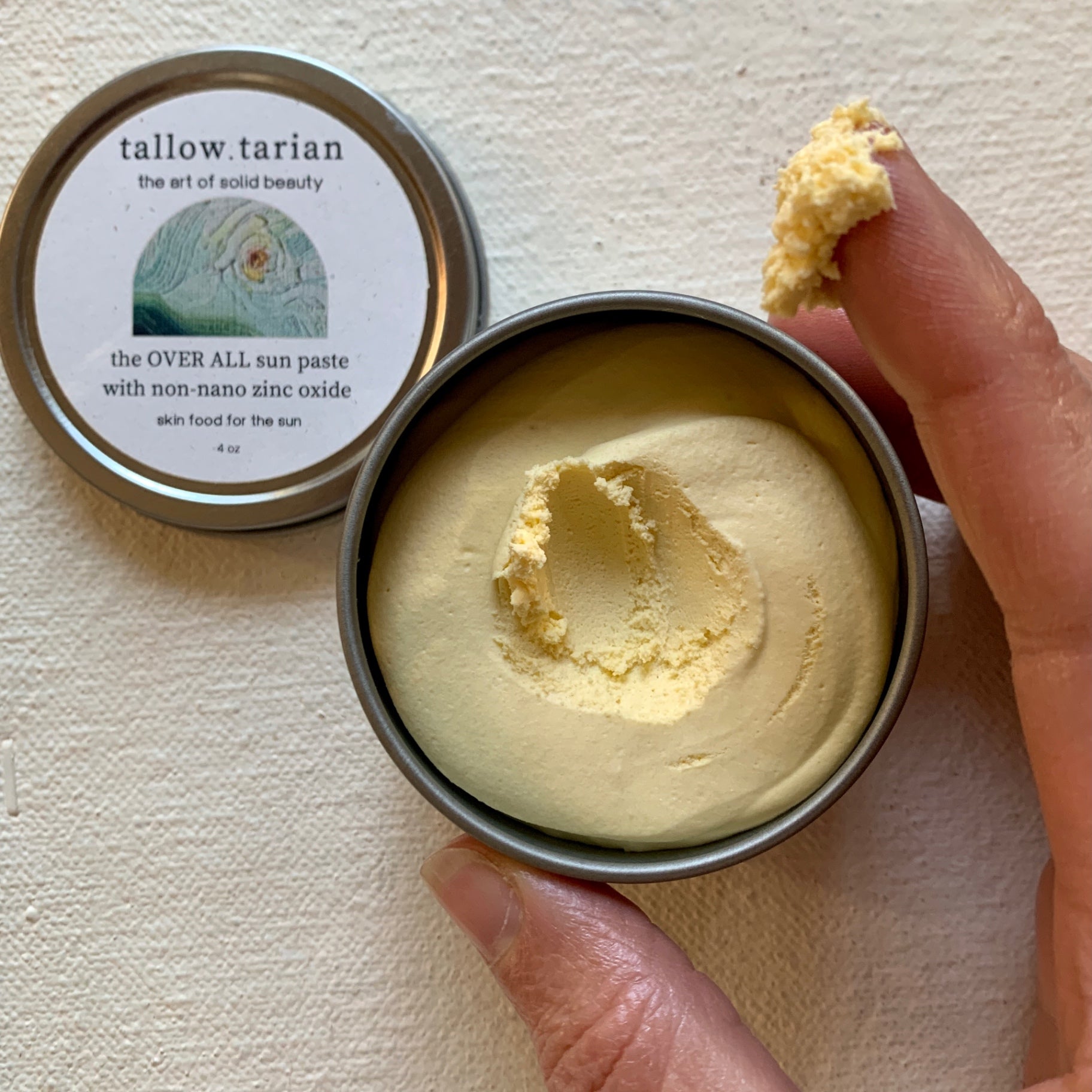Over All Sun Paste 4oz open in hand